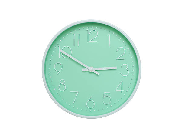 Modern mint green wall clock with white frame and numbers, showing 02:50 AM or 02:50. Ideal for minimalist designs, time-related content, or morning routine visuals.