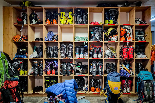 Ski gear in organized shelves, ski boots, Saas-Fee, Swiss Alps