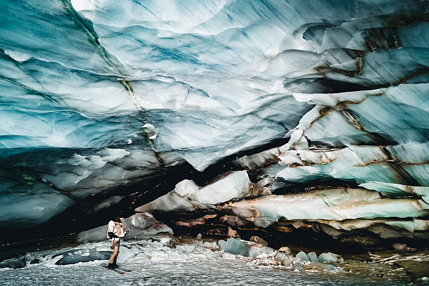 istock Ski mountaineer climbs below giant crevasse 2223689441