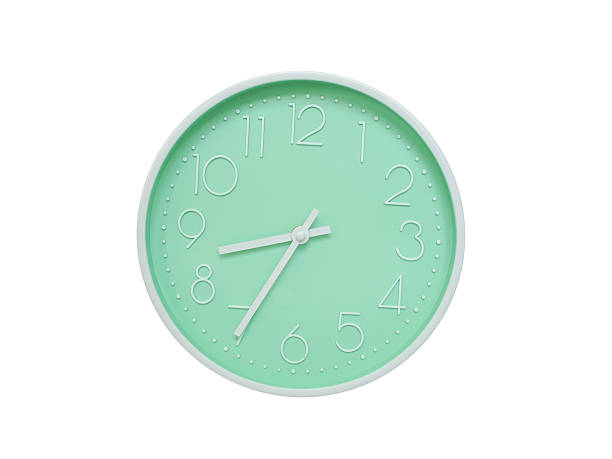 Simple white analog wall clock showing exactly 08:30 or 20:30. suitable for concepts like deadline, start or end of time. Isolated on a clean white background.