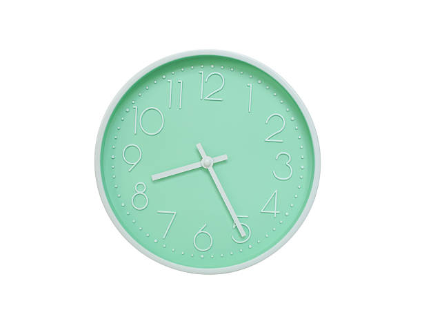 istock Modern mint green wall clock with white frame and numbers, showing 08:25 AM or 08:25. Ideal for minimalist designs, time-related content, or morning routine visuals. 2223689770