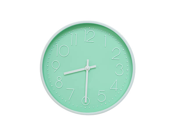 istock Modern mint green wall clock with white frame and numbers, showing 08:30 AM or 08:30. Ideal for minimalist designs, time-related content, or morning routine visuals. 2223689773