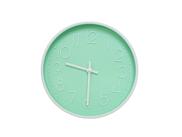 istock Modern mint green wall clock with white frame and numbers, showing 09:30 AM or 09:30. Ideal for minimalist designs, time-related content, or morning routine visuals. 2223689802