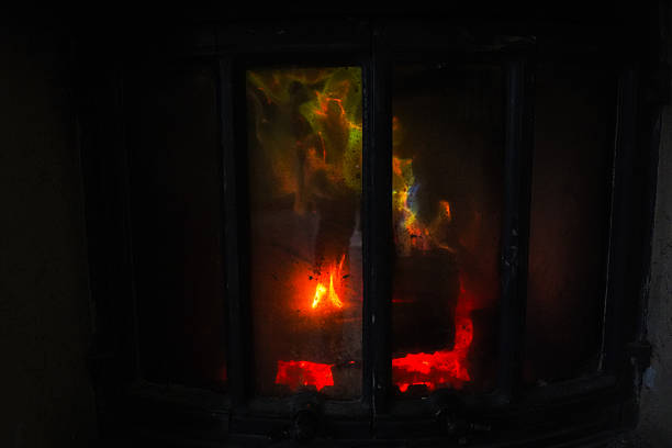 istock Dark and colorful fireplace flame 2223693453