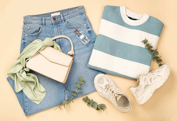 istock Flat lay with women's trendy spring outfit on beige background, top view 2223694749