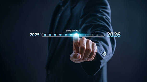 istock Businessman touching digital progress bar from 2025 to 2026 symbolizing future planning, strategic transition, innovation, and growth with focus on leadership, success, and business development 2223694860