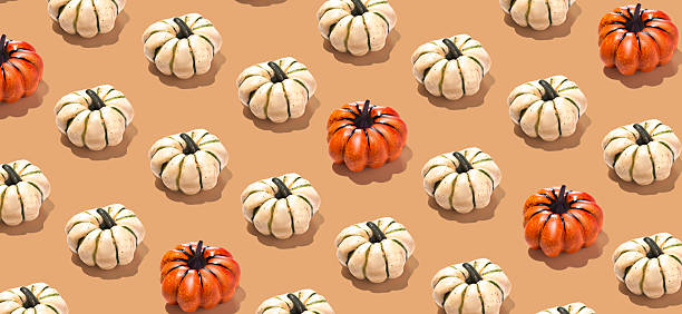 istock Orange and white pumpkins pattern long banner minimal Halloween 2223697425