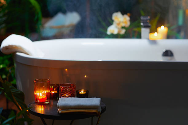 istock Luxurious Candlelit Bathtub in a Serene Bathroom 2223697636