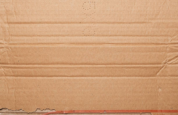 istock Torn crumpled cardboard is used as a background design element. 2223697826