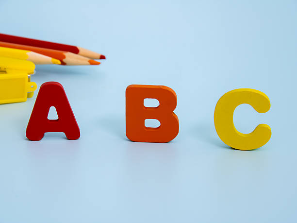 istock Wooden colored letters alphabets and pencils 2223709913
