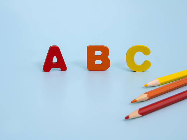 istock Wooden colored letters alphabets and pencils 2223709954