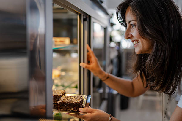 istock Beautiful barista working at coffee shop 2223711465