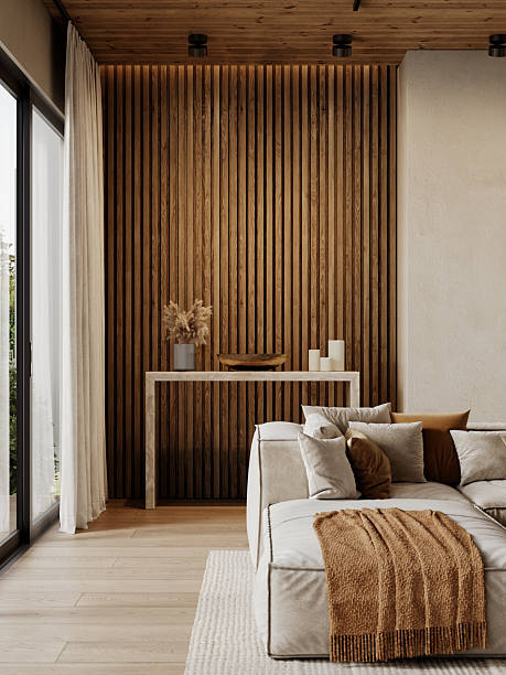 Contemporary loft interior with sofa, brown wood wall panels, pampas grass, console and decor. 3d render illustration mockup.