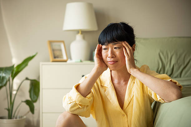 istock Japanese woman having headache 2223728815
