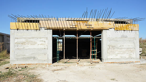 istock construction of a new garage. the building is missing a gate and a roof 2223729675