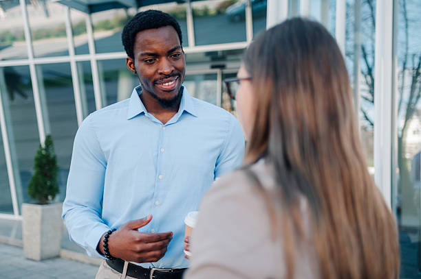 istock Business partners having an informal conversation outside the office 2223733467
