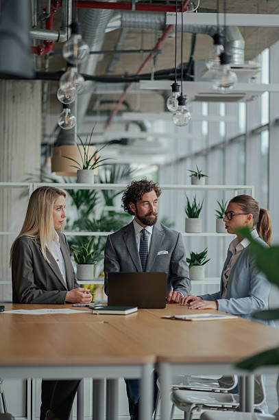 istock Business team discussing strategy in modern office 2223733686