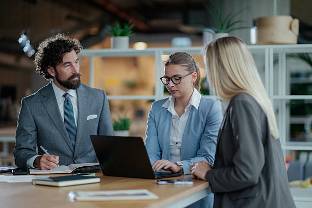 istock Business team working together on a project using laptop in modern office 2223733718