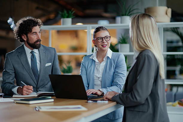 istock Business team discussing a project on a laptop in the office 2223734794