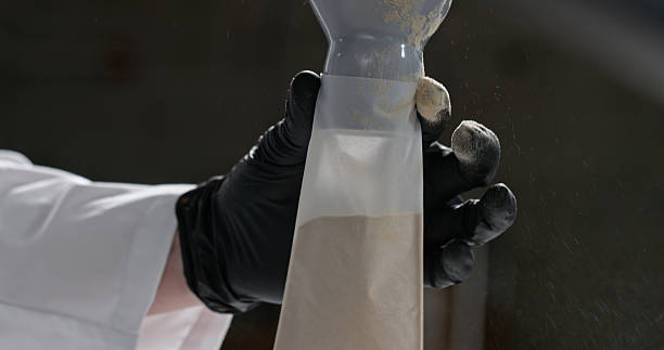 istock Dried Hash Being Funneled Into Rosin Bag For Solventless Extraction 2223740039