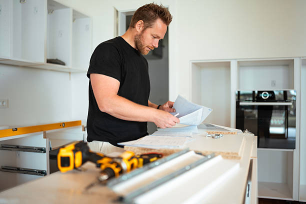 istock Mid Adult Man Working on Kitchen Assembly 2223741897
