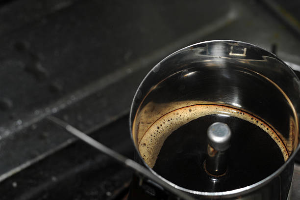istock Macro view showing crema forming during espresso brewing in moka pot 2223747256