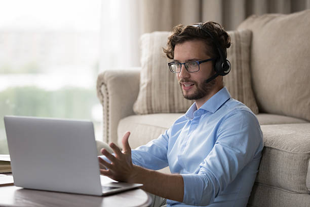 istock Man working from home provide consultation to client by videocall 2223753743