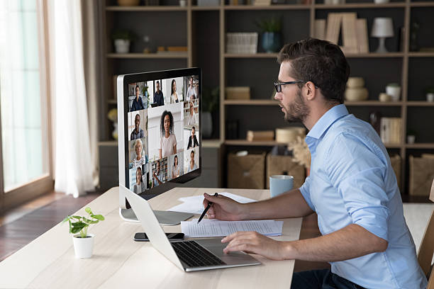 istock Businessman staring at pc screen participate in videoconference 2223753809