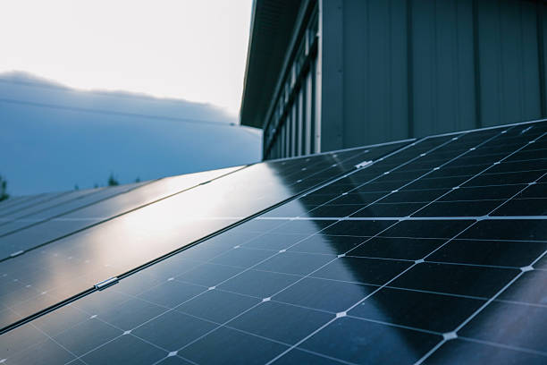 istock Close-up of solar panel surface reflecting soft evening sky light, highlighting clean energy technology details 2223754913