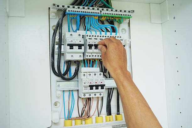 istock Electrician working checking a switchboard with fuses 2223762660