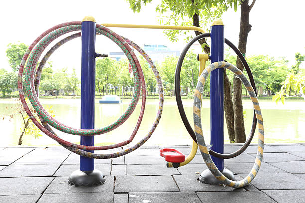 istock Hula hoop,Outdoor exercise machines in public park 2223766604
