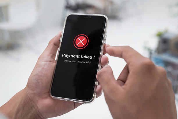 istock Payment failed, declined. Online financial transaction notification with red cross in application showing error on smartphone. 2223770072