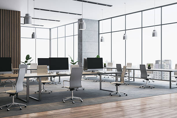 istock Modern empty coworking office interior with minimalist design, wooden floor, panoramic city view, white walls, and corporate workspace setup. 3D Rendering 2223771009