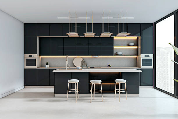 istock Modern dark kitchen interior with island, bar stools, and backlit cabinets in a bright high-rise apartment with city view and elegant design. 3D Rendering 2223771044
