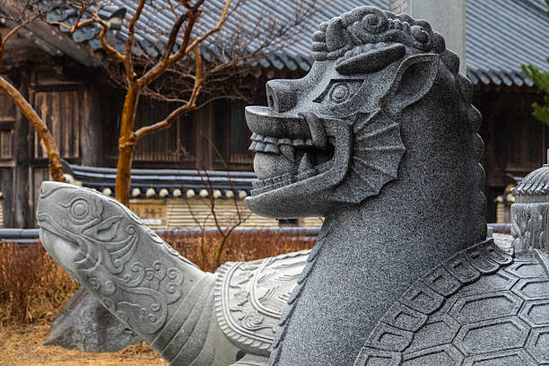 animal statue at the Buddhist temple in the rain