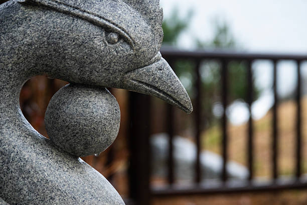 animal statue at the Buddhist temple in the rain