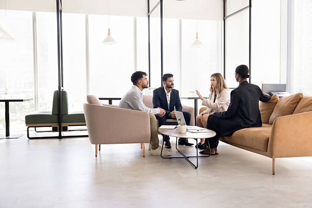 istock Diverse business partners meet for informal briefing in shared workspace 2223777938
