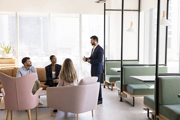 istock Male business coach speak before multicultural team on casual training 2223778087