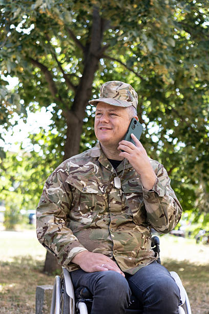 Veteran in a wheelchair. About 50 years old, Caucasian male.