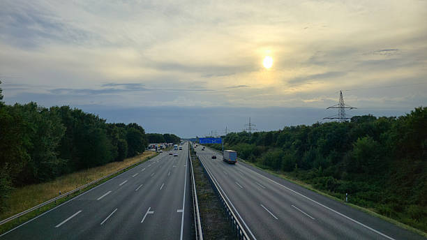 istock A serene sunset casts a warm glow over a tranquil highway, enhancing the peaceful scene Hannover Langenhagen 2223781401