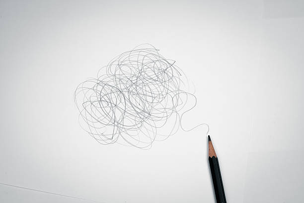 A pencil leaning against the wall. Idea light bulb shade reflect on the wall.\nIdea concept.