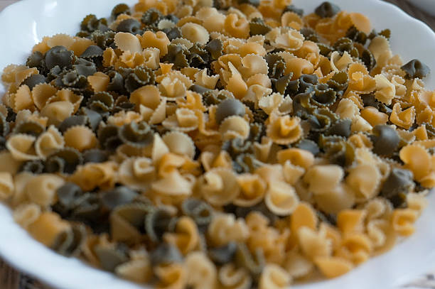 istock Campanelle pasta displayed on white plate, creating appealing culinary scene 2223784389