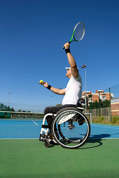 istock Disabled man playing a tennis match 2223784463