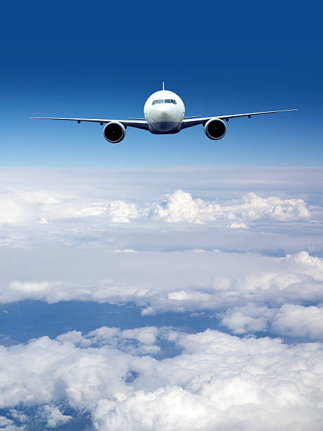 istock Passenger jet airplane flying above clouds 2223788629