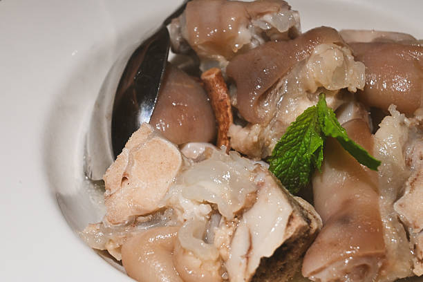 Delicious Pig Trotter Soup with Mint Garnish