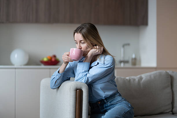 istock Thoughtful middle aged woman slowly drinking coffee feeling loneliness, thinking about relationship 2223797014