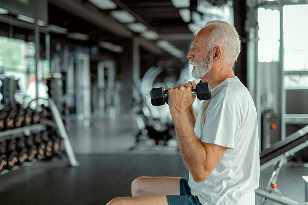 istock Active Senior Male Lifting Weights for Strength and Health 2223797628