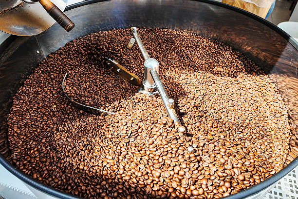 istock Freshly Roasted Coffee Beans in Industrial Roaster 2223800434