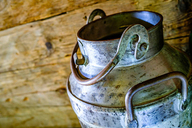 Old milk cans at cheese producing manufacturer