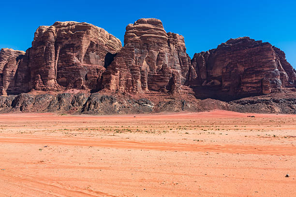 istock Wadi Rum Rocky Landscape under Clear Blue Sky 2223807644